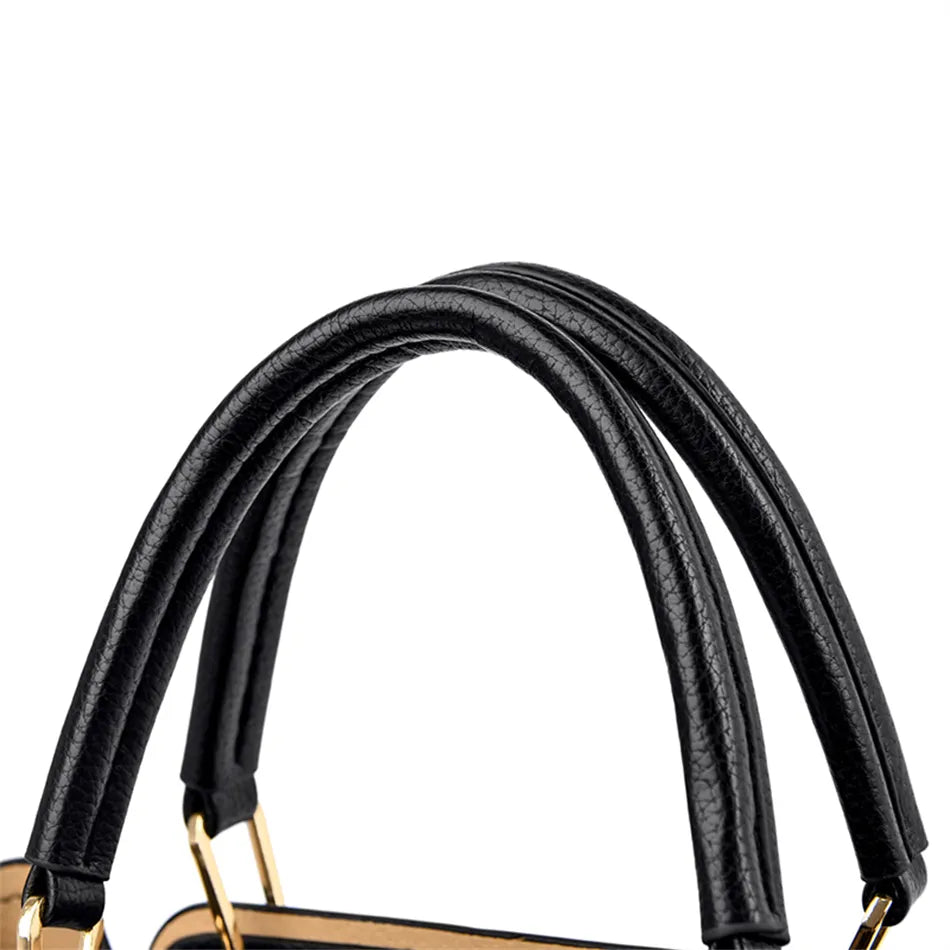 A stylish soft leather triple layer crossbody tote handbag with letter and kangaroo pendant decorations, perfect for women on the go.