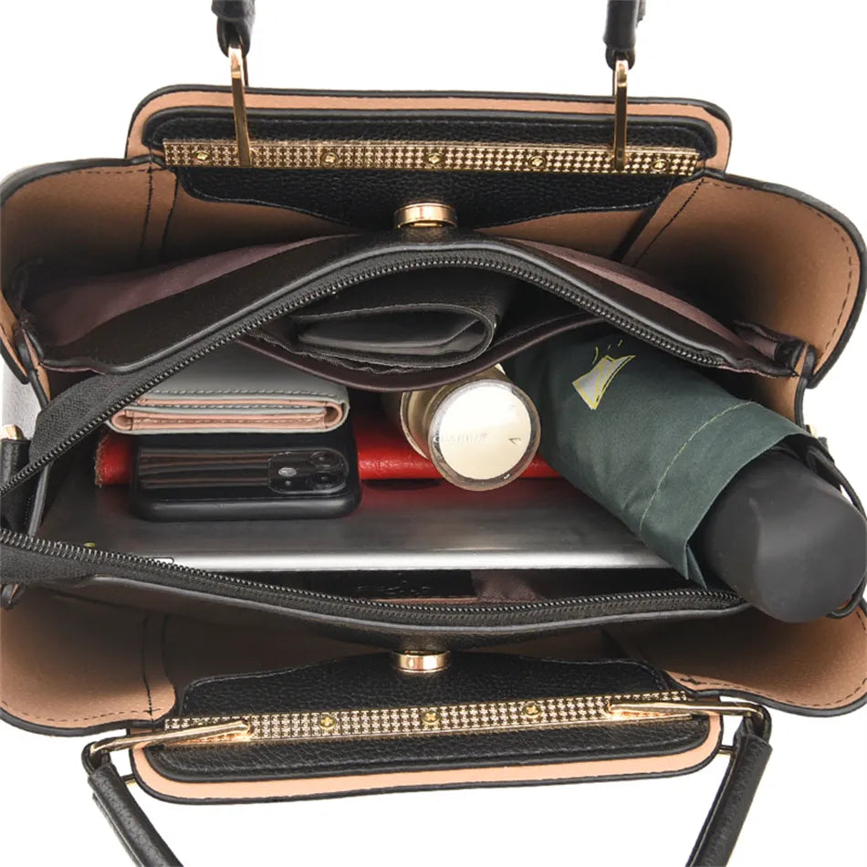A stylish soft leather triple layer crossbody tote handbag with letter and kangaroo pendant decorations, perfect for women on the go.