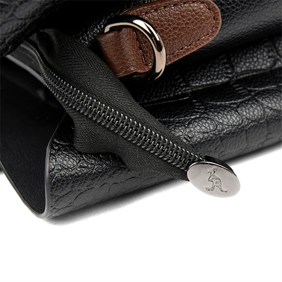 A stylish genuine leather alligator shoulder bag adorned with letter, sequined, kangaroo, and leaf ornament decorations, perfect for women on the go.