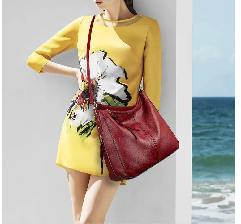 A stylish PU leather shoulder hobo bag with zipper closure and multiple interior pockets, perfect for versatile use by women.