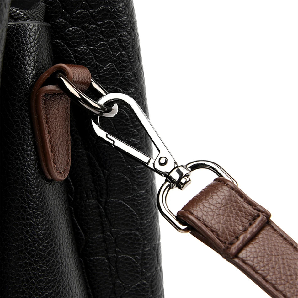 A stylish genuine leather alligator shoulder bag adorned with letter, sequined, kangaroo, and leaf ornament decorations, perfect for women on the go.