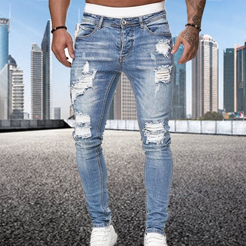 Men's Fashion Street Style Ripped Skinny Jeans with stonewashed and distressed details. Perfect for spring and autumn street style.