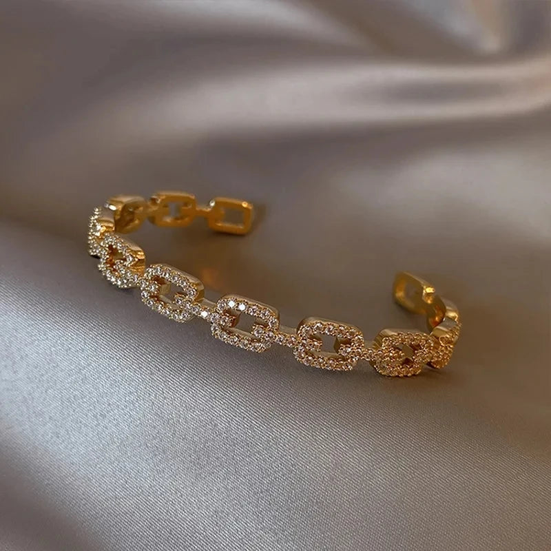 Bamboo Bracelet - Gold-color plated bangle with a sleek geometric design, made from high-quality zinc alloy. Perfect for fashion-forward women.