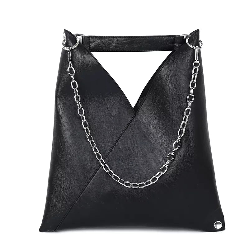 A stylish PU leather simple shoulder bag with rivet decoration, perfect for versatile use by women.
