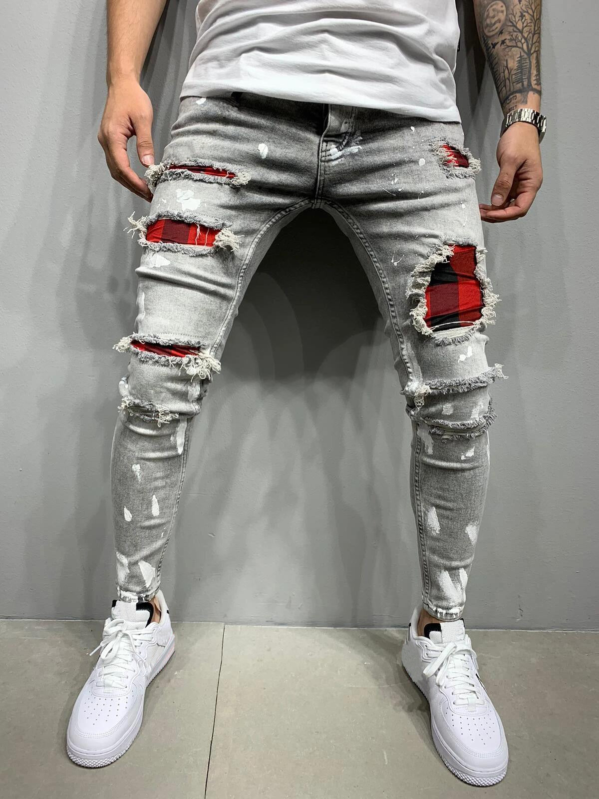 Men's Fashion Street Style Ripped Skinny Jeans with stonewashed and distressed details. Perfect for spring and autumn street style.