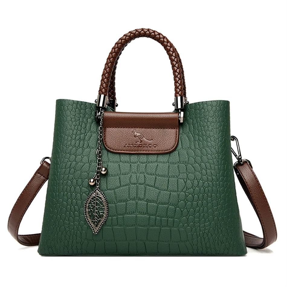A stylish genuine leather alligator shoulder bag adorned with letter, sequined, kangaroo, and leaf ornament decorations, perfect for women on the go.