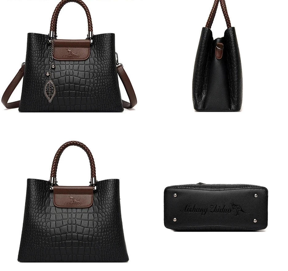 A stylish genuine leather alligator shoulder bag adorned with letter, sequined, kangaroo, and leaf ornament decorations, perfect for women on the go.