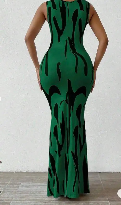 Woman wearing a sleeveless V-neck wrap midi dress with printed pattern, slim fit, ankle-length – elegant summer office style