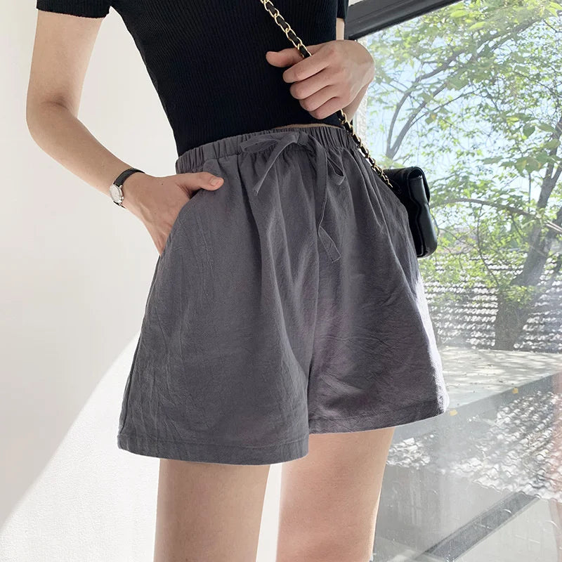 High-Waisted Casual Linen Shorts with bows, ribbons, sashes, and a distressed look, made from cotton-linen blend with an elastic waist, perfect for all-season wear.