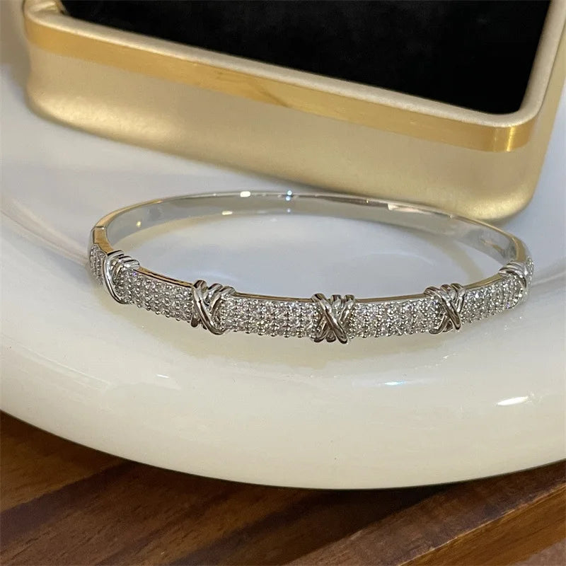Bamboo Bracelet - Gold-color plated bangle with a sleek geometric design, made from high-quality zinc alloy. Perfect for fashion-forward women.