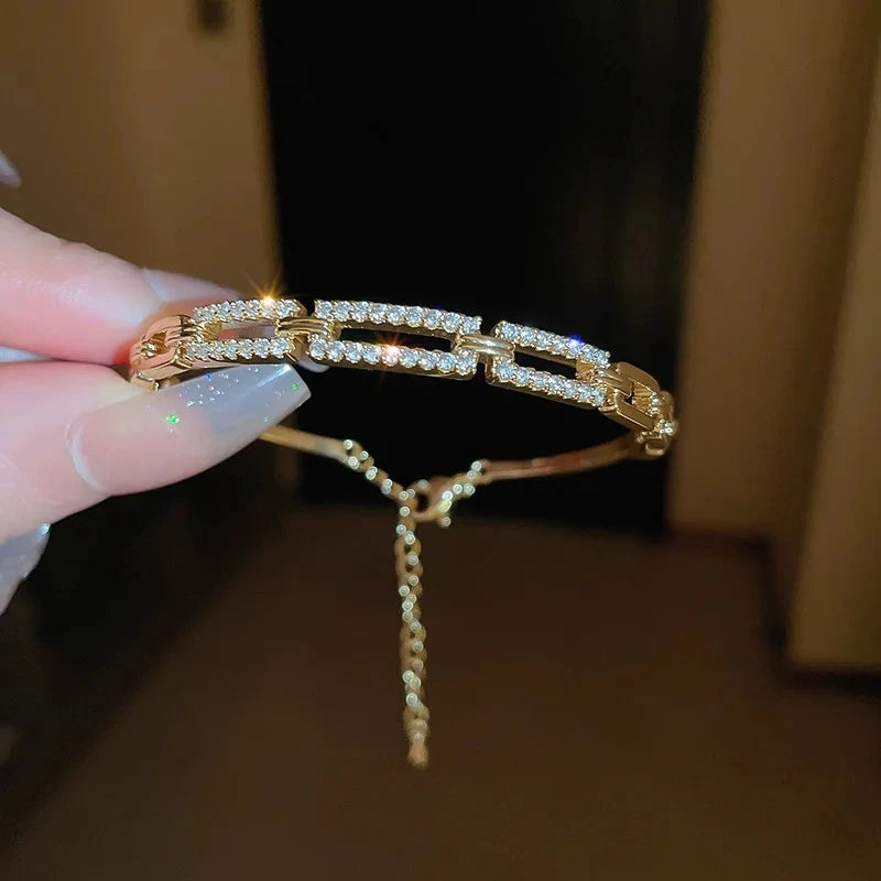 Bamboo Bracelet - Gold-color plated bangle with a sleek geometric design, made from high-quality zinc alloy. Perfect for fashion-forward women.