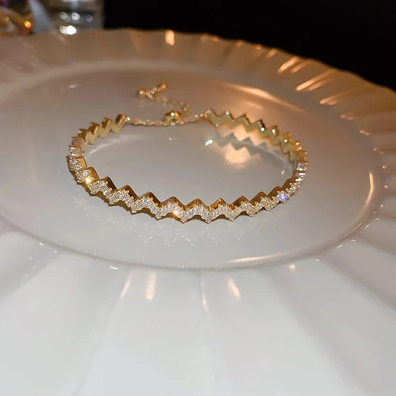 Bamboo Bracelet - Gold-color plated bangle with a sleek geometric design, made from high-quality zinc alloy. Perfect for fashion-forward women.