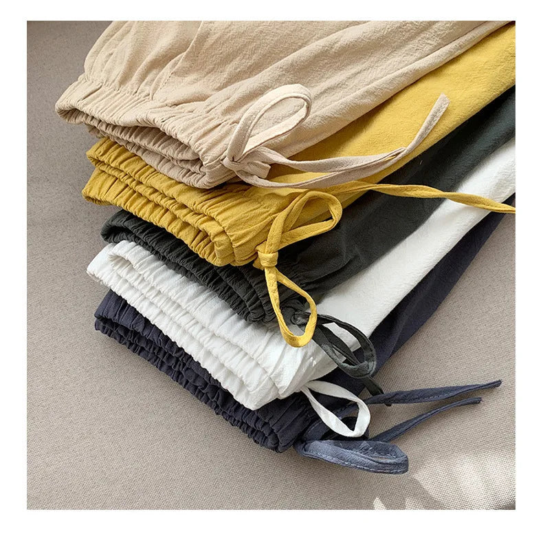 High-Waisted Casual Linen Shorts with bows, ribbons, sashes, and a distressed look, made from cotton-linen blend with an elastic waist, perfect for all-season wear.