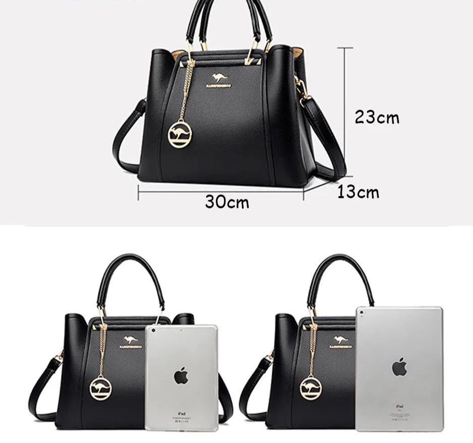 A stylish soft leather triple layer crossbody tote handbag with letter and kangaroo pendant decorations, perfect for women on the go.