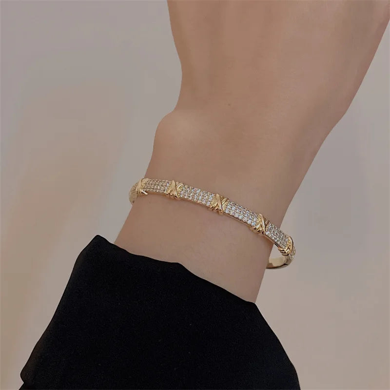 Bamboo Bracelet - Gold-color plated bangle with a sleek geometric design, made from high-quality zinc alloy. Perfect for fashion-forward women.