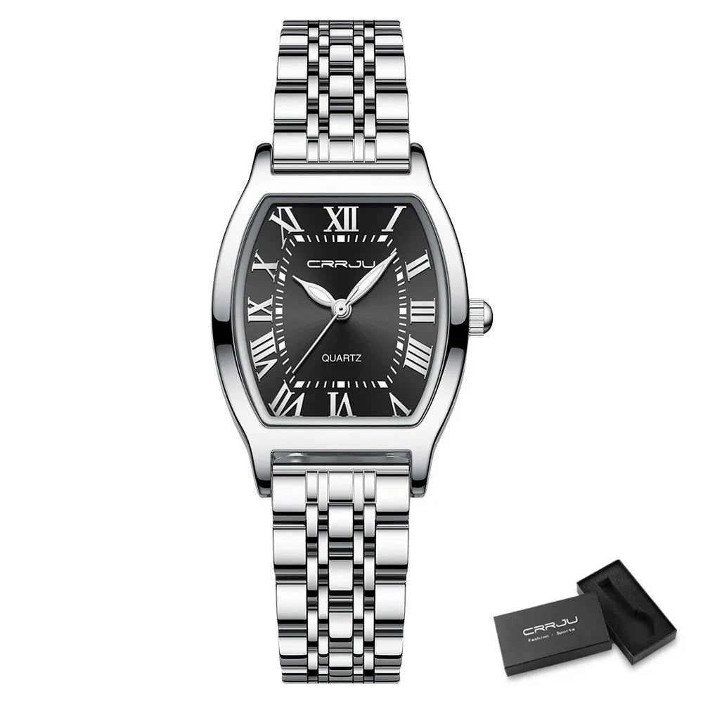 A close-up of a Steel Dress Bracelet Watch featuring a tonneau-shaped alloy case and stainless steel bracelet. The watch dial displays the time against a Hardlex window, with water resistance up to 3Bar.