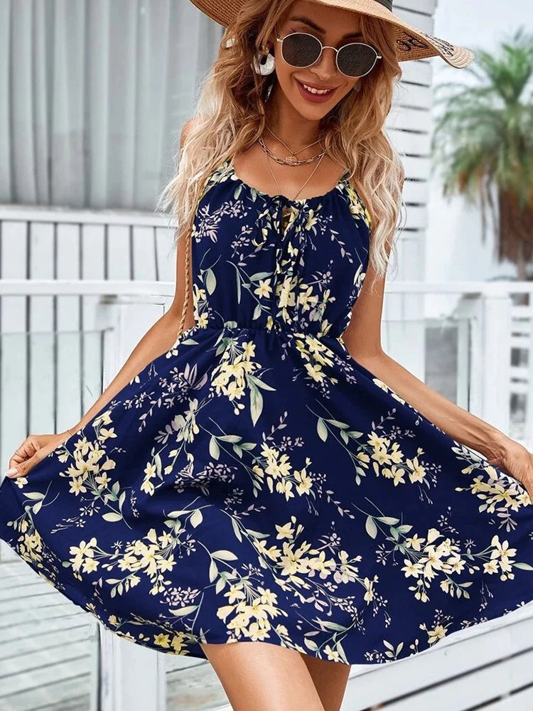 Floral Print Backless Sundress with empire waistline, spaghetti strap neckline, and A-LINE silhouette. Made from POLYESTER and SPANDEX blend, featuring lace-up detail. Perfect summer fashion from True Radiant Treasures..