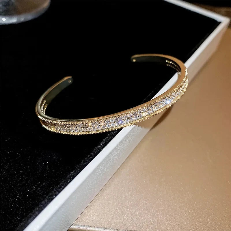Bamboo Bracelet - Gold-color plated bangle with a sleek geometric design, made from high-quality zinc alloy. Perfect for fashion-forward women.