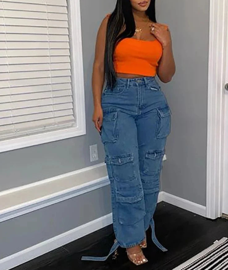 A pair of Street Chic Cargo Jeans in denim blue and gray, featuring button decorations and functional pockets. Made from polyester and cotton elastic denim, perfect for any season. High-waisted with a regular fit. Available in sizes S to 3XL. Designed for middle-aged women.