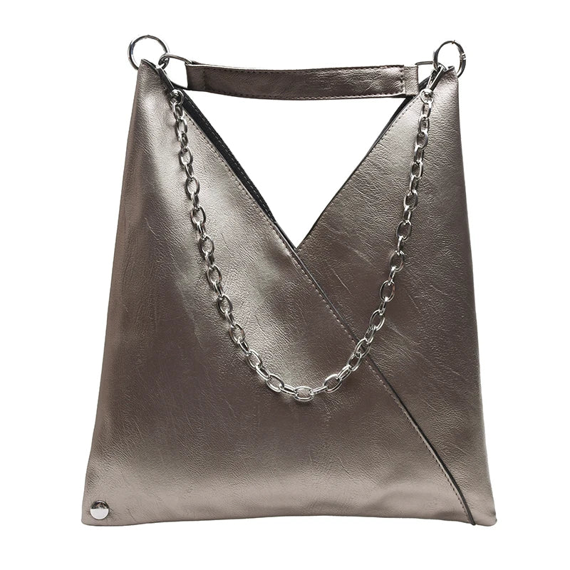 A stylish PU leather simple shoulder bag with rivet decoration, perfect for versatile use by women.