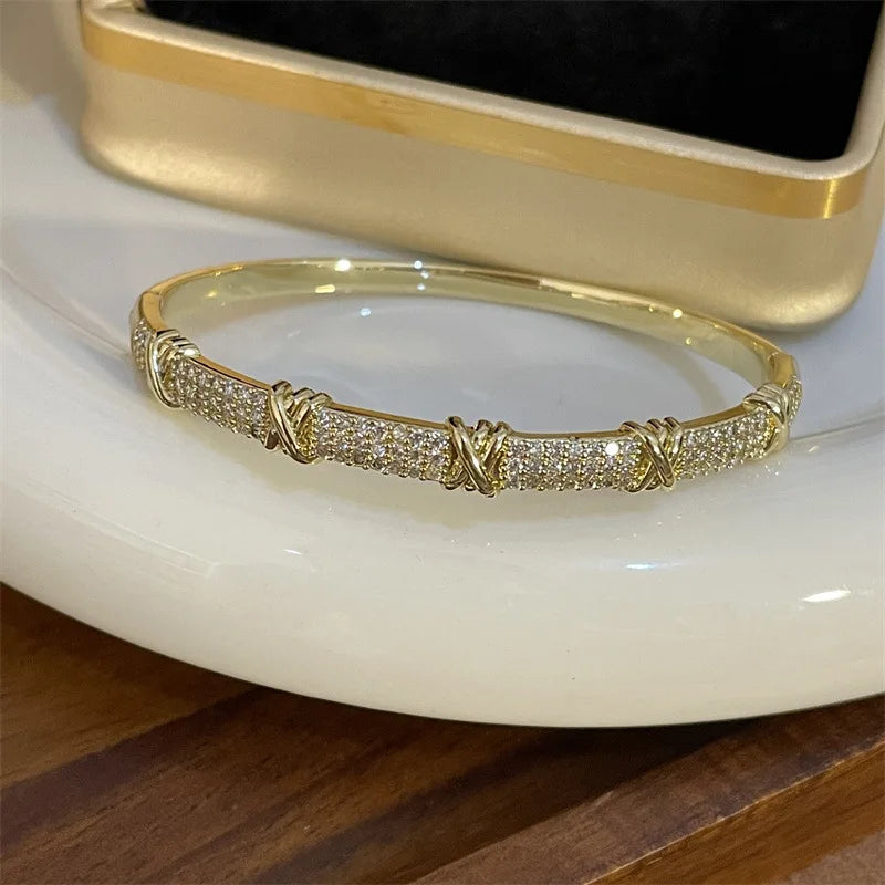 Bamboo Bracelet - Gold-color plated bangle with a sleek geometric design, made from high-quality zinc alloy. Perfect for fashion-forward women.