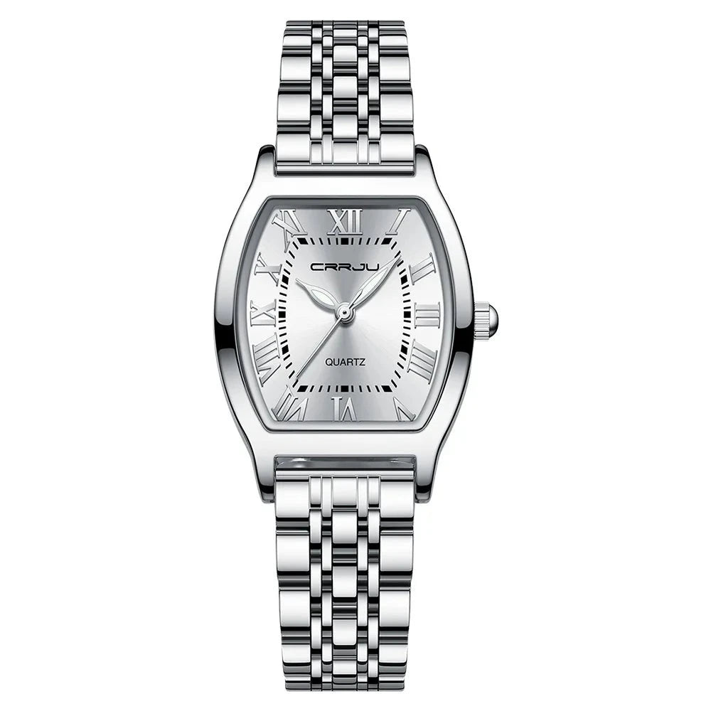 A close-up of a Steel Dress Bracelet Watch featuring a tonneau-shaped alloy case and stainless steel bracelet. The watch dial displays the time against a Hardlex window, with water resistance up to 3Bar.