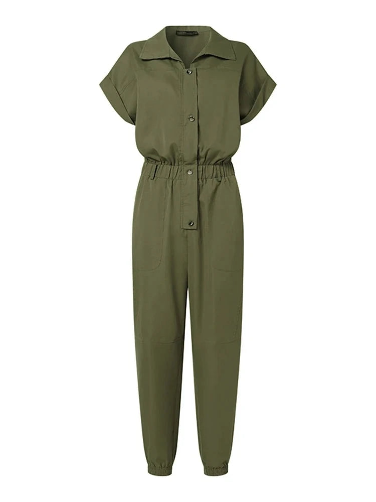 High Street Cargo Jumpsuit in POLYESTER broadcloth, featuring high waist and ankle-length cargo pants. Decorative pockets add flair. Lightweight and stylish summer fashion for women.