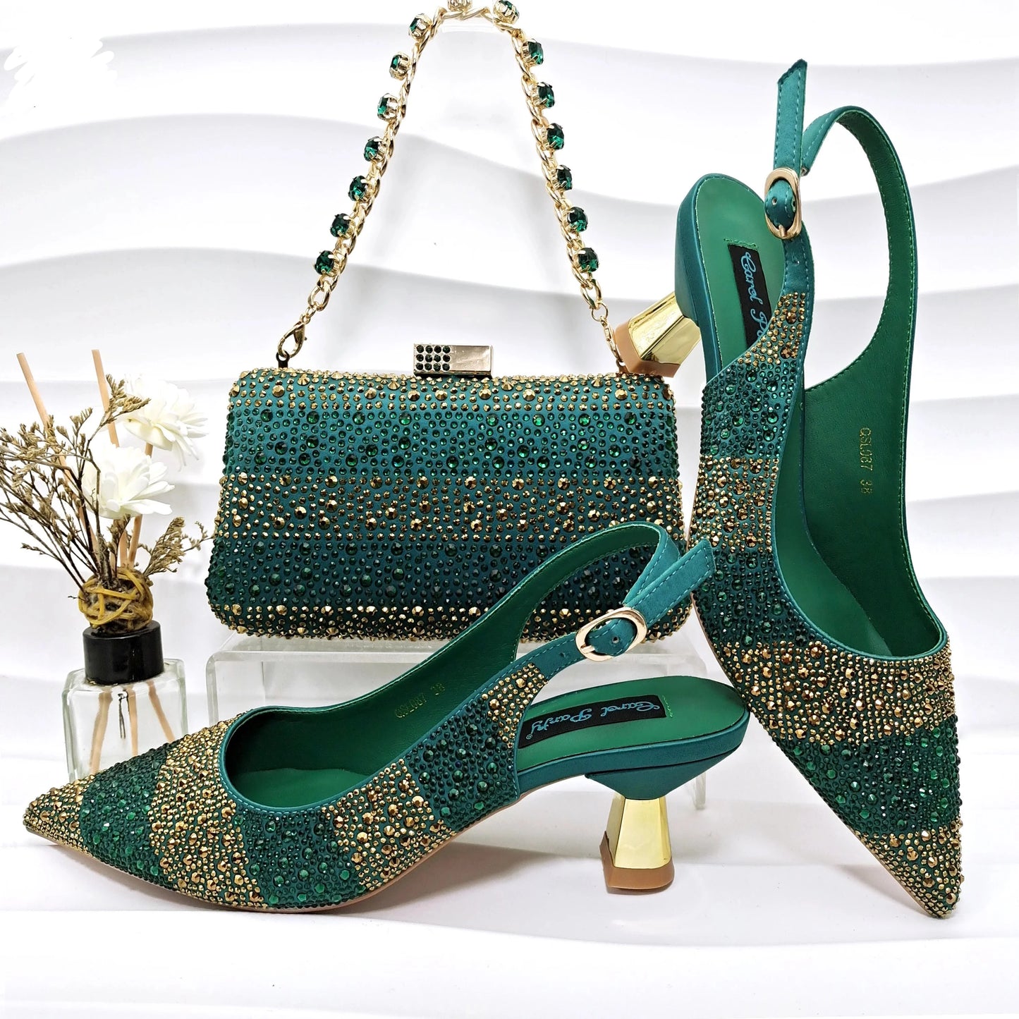 Image of Fashion Forward Strange Style Slingback Pumps in green color, featuring a pointed toe, super high strange style heel, and crystal embellishments. Perfect for parties and special occasions.