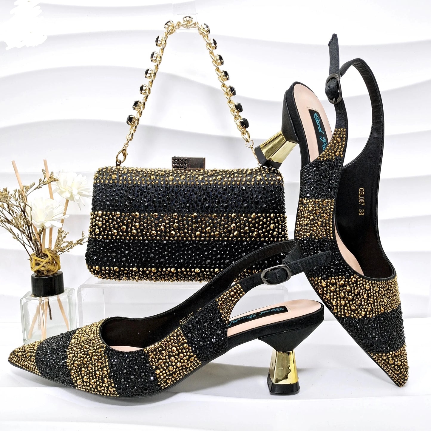 Image of Fashion Forward Strange Style Slingback Pumps in gold color, featuring a pointed toe, super high strange style heel, and crystal embellishments. Perfect for parties and special occasions.
