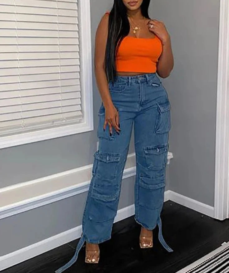 A pair of Street Chic Cargo Jeans in denim blue and gray, featuring button decorations and functional pockets. Made from polyester and cotton elastic denim, perfect for any season. High-waisted with a regular fit. Available in sizes S to 3XL. Designed for middle-aged women.