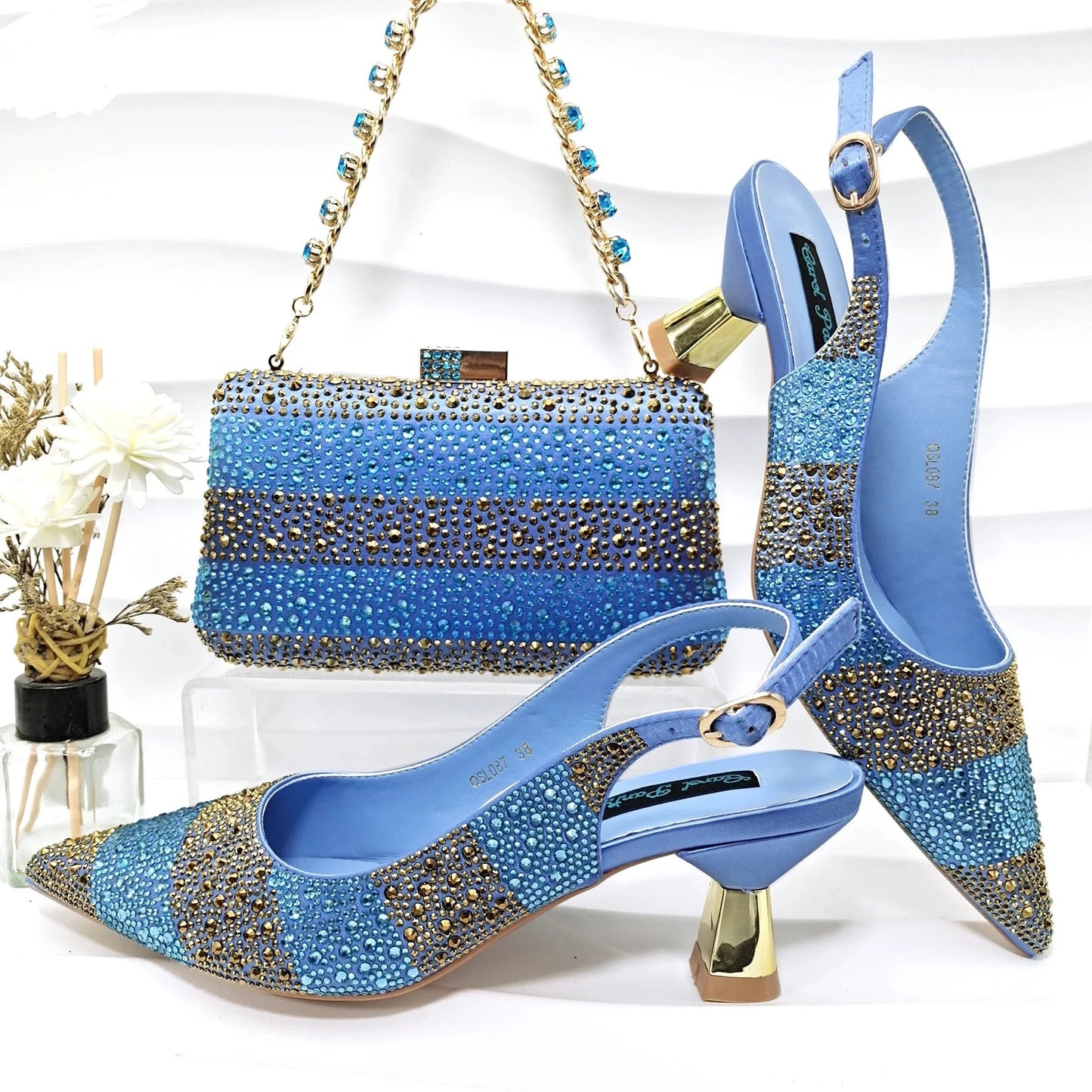 Image of Fashion Forward Strange Style Slingback Pumps in blue color, featuring a pointed toe, super high strange style heel, and crystal embellishments. Perfect for parties and special occasions.