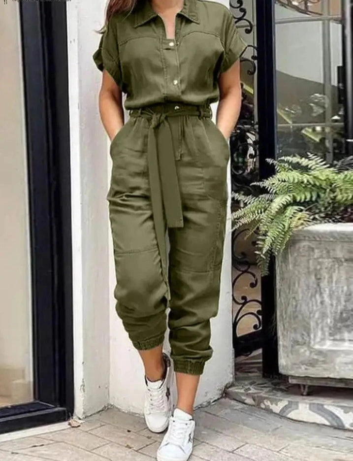 High Street Cargo Jumpsuit in POLYESTER broadcloth, featuring high waist and ankle-length cargo pants. Decorative pockets add flair. Lightweight and stylish summer fashion for women.