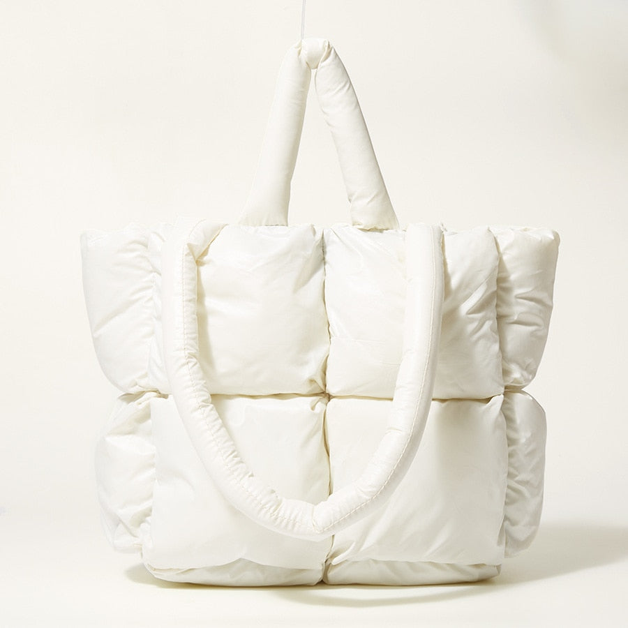 True Radiant Treasures winter quilted bag in vibrant colors. Functional and stylish with a secure zipper closure and inside pocket. Can be carried over the shoulder or across the body.