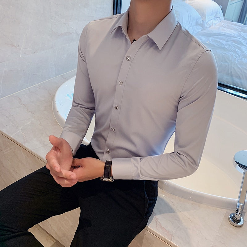 British Style Long Sleeve Shirt - Perfect for the office - Made with polyester and spandex - Cozy and warm - Pair with slacks and formal shoes.