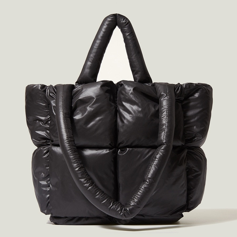 True Radiant Treasures winter quilted bag in vibrant colors. Functional and stylish with a secure zipper closure and inside pocket. Can be carried over the shoulder or across the body.