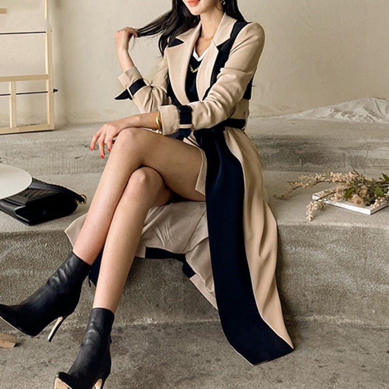 Stylish and durable Elegant Long Trench Coat made of cotton and polyester.