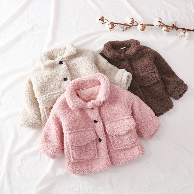 Girl's Fashion Winter Jacket made from polyester, wool, and blends to keep kids warm and dry. Available in white, brown, and pink, sizes for 1 to 12 years old. Order now to prepare for winter!