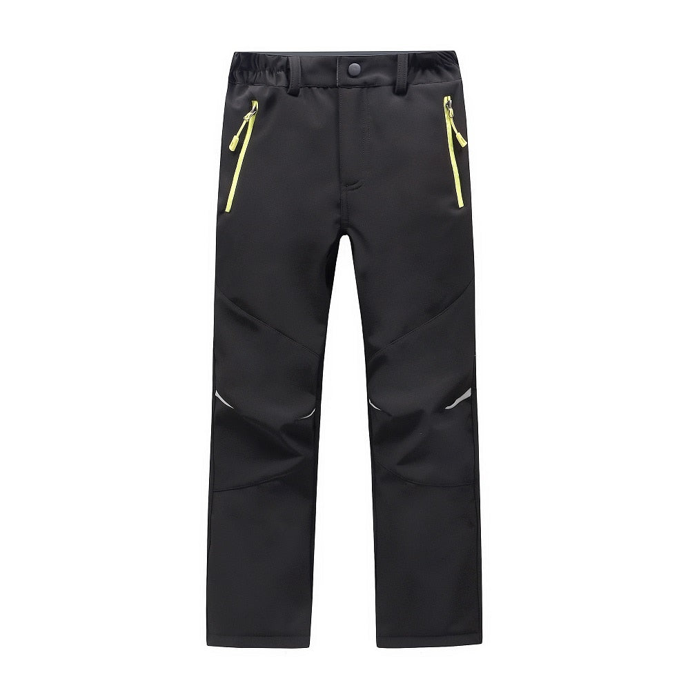 Waterproof Warm Trousers for boys, perfect for fall outdoor activities. Made of polyester and cotton for style, warmth, and comfort. Available in different colors. True-to-size fit based on waist size.