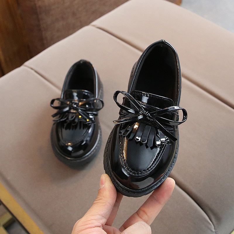 Durable leather school shoes for girls, perfect for everyday wear.