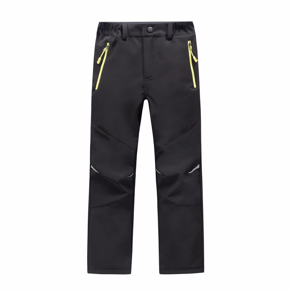 Waterproof Warm Trousers for boys, perfect for fall outdoor activities. Made of polyester and cotton for style, warmth, and comfort. Available in different colors. True-to-size fit based on waist size.