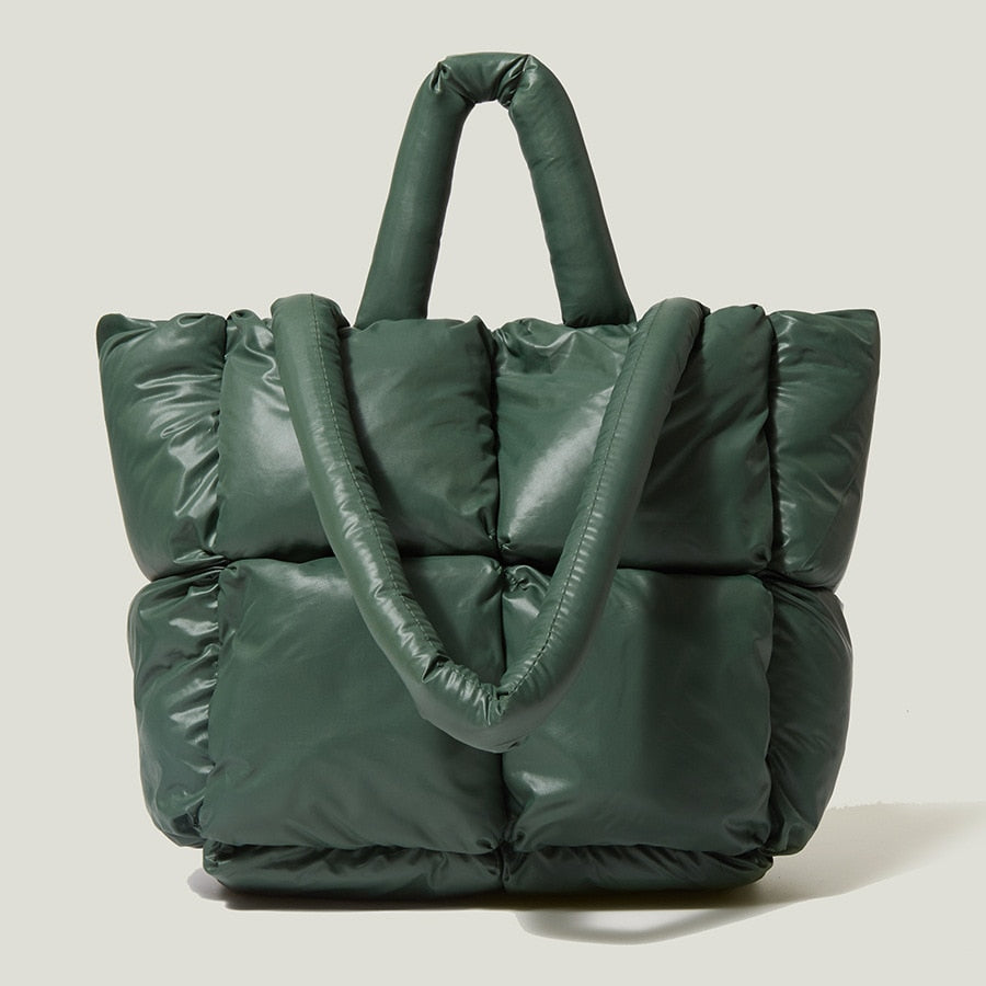 True Radiant Treasures winter quilted bag in vibrant colors. Functional and stylish with a secure zipper closure and inside pocket. Can be carried over the shoulder or across the body.