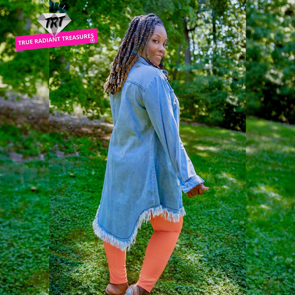 Chic woman wearing Long Denim Jacket with turn-down collar and empire waistline, styled as a mini dress with high heels