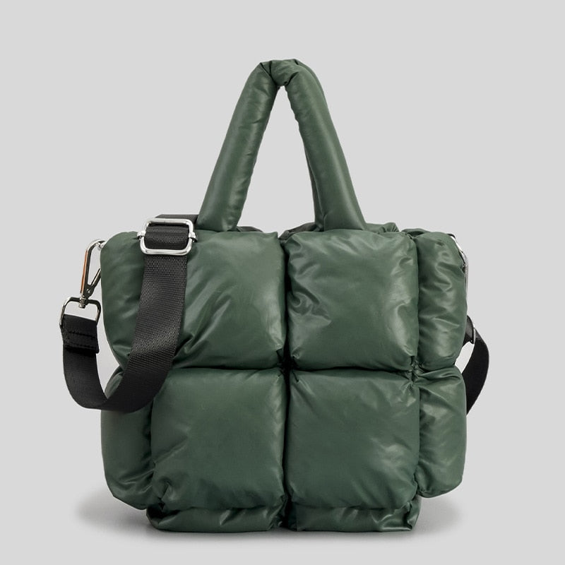 True Radiant Treasures winter quilted bag in vibrant colors. Functional and stylish with a secure zipper closure and inside pocket. Can be carried over the shoulder or across the body.