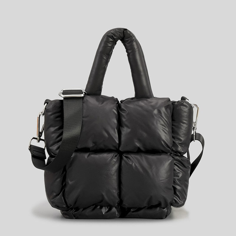 True Radiant Treasures winter quilted bag in vibrant colors. Functional and stylish with a secure zipper closure and inside pocket. Can be carried over the shoulder or across the body.