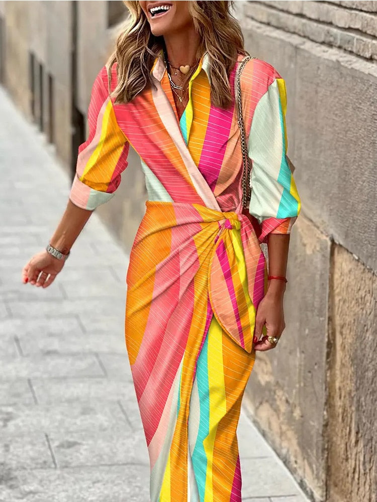 Stunning spring v-neck dress with ankle-length design, vibrant colors, and comfortable polyester-acetate fabric for a versatile and fashionable look.