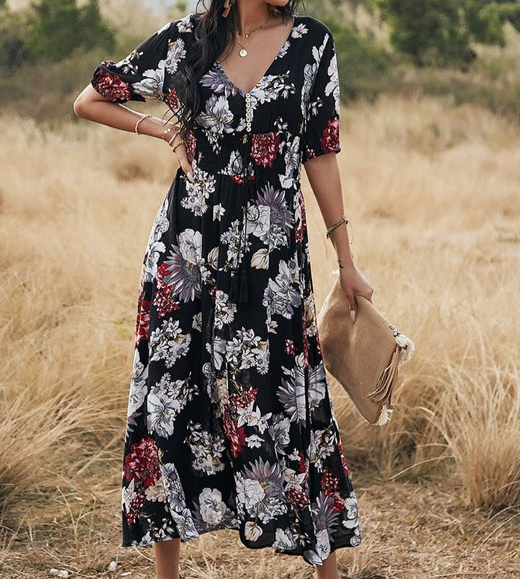 Long floral dress for spring and summer seasons - perfect for any occasion with its vibrant floral print and durable polyester material.