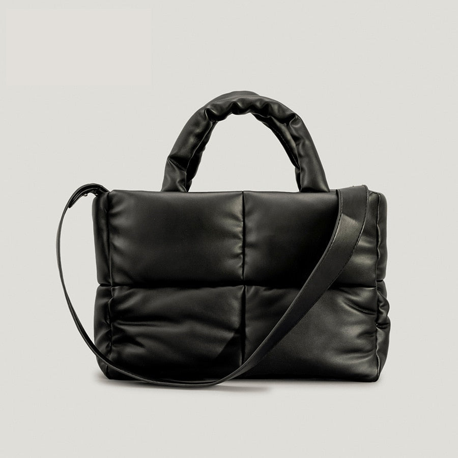 True Radiant Treasures winter quilted bag in vibrant colors. Functional and stylish with a secure zipper closure and inside pocket. Can be carried over the shoulder or across the body.