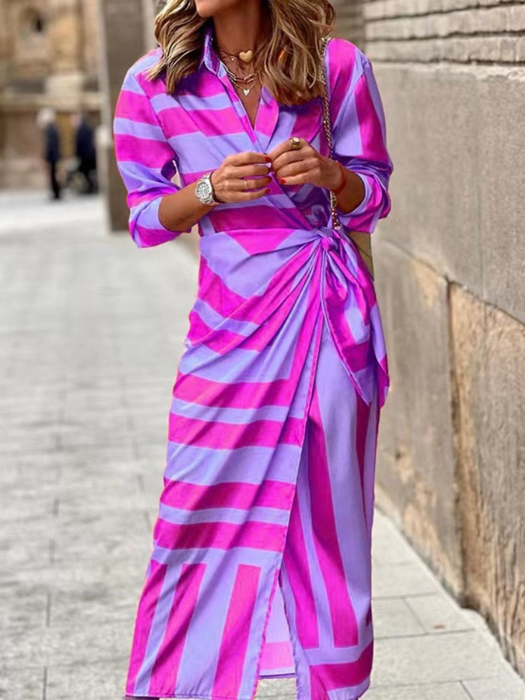 Stunning spring v-neck dress with ankle-length design, vibrant colors, and comfortable polyester-acetate fabric for a versatile and fashionable look.
