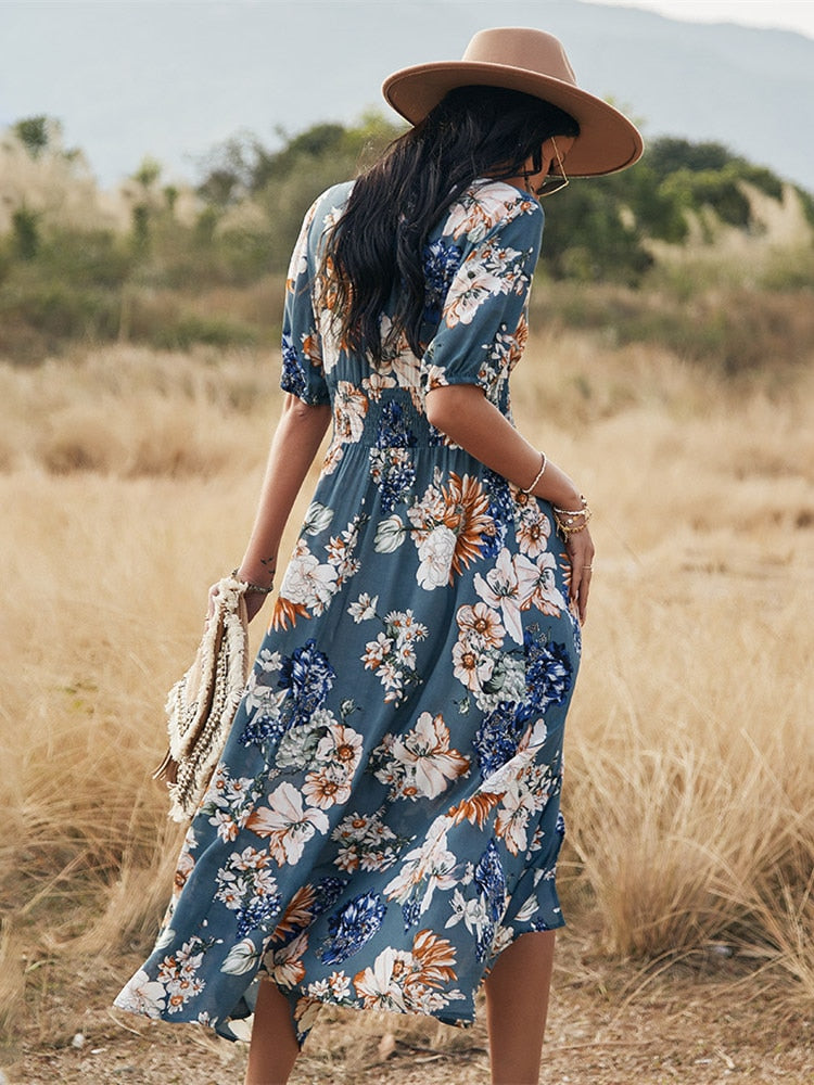 Long floral dress for spring and summer seasons - perfect for any occasion with its vibrant floral print and durable polyester material.