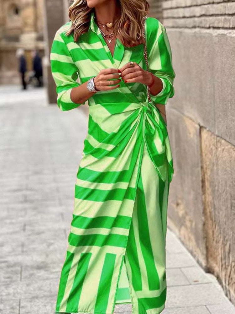 Stunning spring v-neck dress with ankle-length design, vibrant colors, and comfortable polyester-acetate fabric for a versatile and fashionable look.